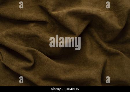 Green fabric texture as a background. Top view. Stock Photo
