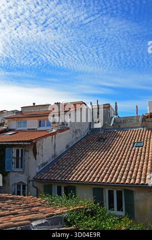 Tiled roofs of old houses on Rue Sainte-Espiritu in Antibes in France Stock Photo