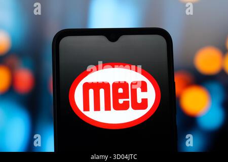In this photo illustration, the MEC (Mayville Engineering Company) logo is seen displayed on a smartphone screen. Stock Photo