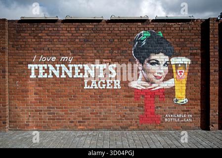 Mural on the wall of Tennent Caledonian Breweries, Duke Street, Glasgow, Scotland, UK. Stock Photo