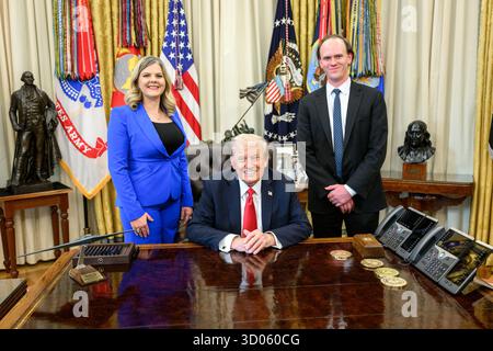 President Donald Trump speaks alongside first lady Melania Trump after ...