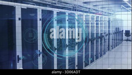 Lining server racks stretching data center corridor, with overhead cable trays and digital overlay Stock Photo