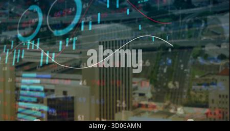 Displaying digital market data overlay over office towers and streets in downtown, with tickers Stock Photo