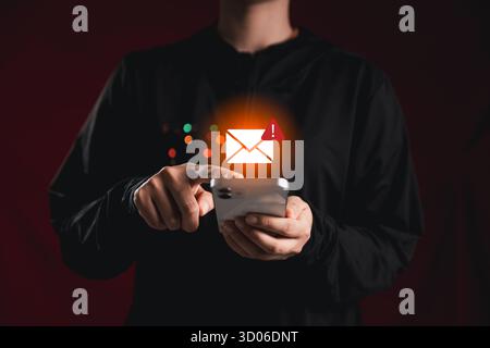 Businesswoman check smartphone inbox, receives warning notification about potential cybersecurity breach, concept of spam email detection, error check Stock Photo