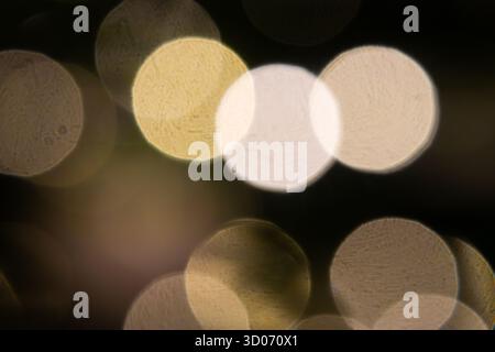 Gold bokeh lights background. Golden bokeh wallpaper. Stock Photo