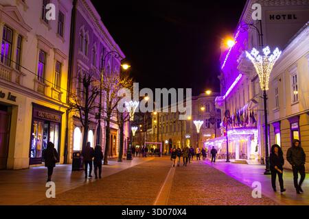 Street decorated with christmas lights and ornaments in sibiu, Romania Stock Photo
