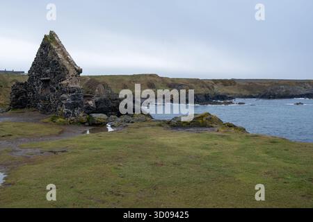 North sea cliffs at Portsoy village, Aberdeenshire, Scotland Stock Photo