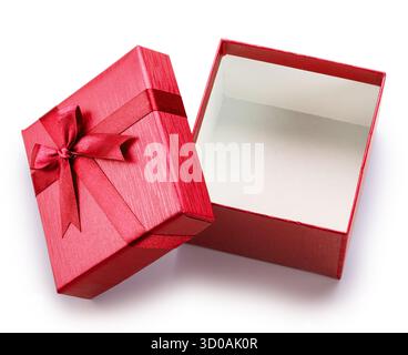 Opened empty red gift box and lid with satin bow near it isolated on white background. File contains clipping path. Stock Photo