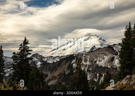 WA28627-00...WASHINGTON - Clouds forming over Mount Baker from Kulshan Ridge, Stock Photo