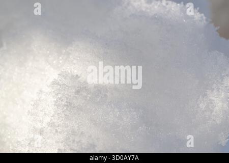 Snow Texture in Soft Winter Sunlight Stock Photo