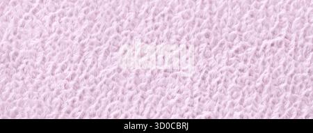 Light lilac background from soft fluffy textile material macro. Texture of violet plush fabric backdrop. Wavy pattern. Stock Photo