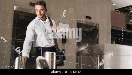 Office worker holding bag scanning access card at turnstile in corporate lobby, with pound overlay Stock Photo