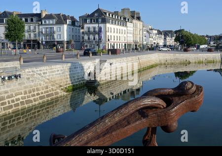 Rusted anchor at the entrance gate of the Ville Close in the old port of Concarneau, Brittany, Northern France Stock Photo
