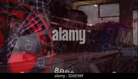 Metalworker wearing plaid shirt using angle grinder generating sparks in workshop with red overlay Stock Photo