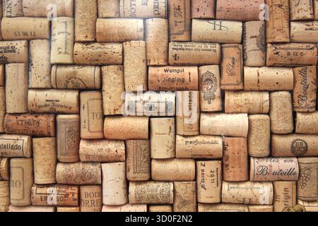 Corks from wine bottles laid out in a regular pattern, wine corks, red wine Stock Photo