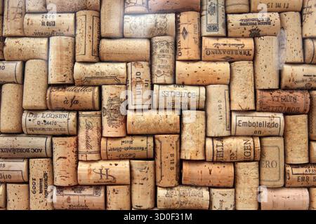 Corks from wine bottles laid out in a regular pattern, wine corks, red wine Stock Photo