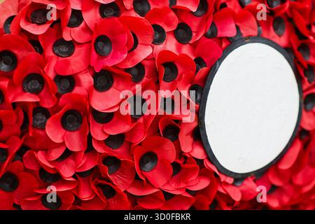 Remembrance Day Poppy Wreaths at Memorial. World War remembrance day. Stock Photo