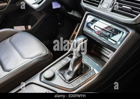 New car interior dashboard with automatic gearbox lever. Top down, wide angle view, no people Stock Photo
