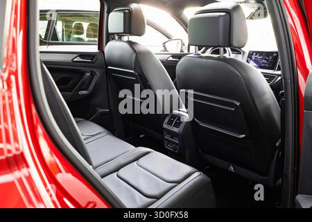 New car empty leather back seats. Close up, wide angle view, no people Stock Photo