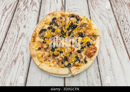 Fig Pizza with fresh figs, Serrano ham, goat cheese, and balsamic vinegar reduction Stock Photo