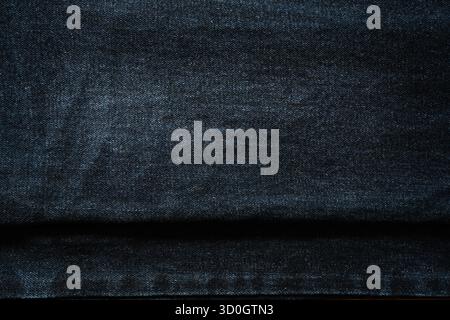 Layers of dark blue jeans texture Stock Photo