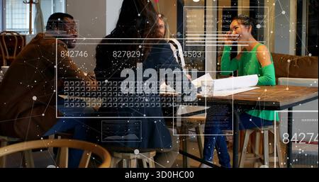 Holding rolled-up plan, team studying documents with eyeglasses on table in office, network overlay Stock Photo