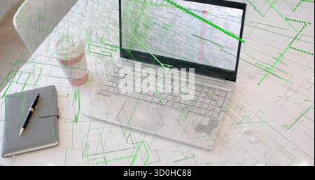 Showing laptop running spreadsheet on office desk with notebook, pen, coffee cup, circuit overlay Stock Photo