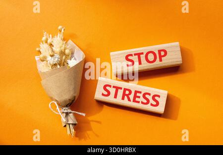 Stop stress and be health symbol. Wooden cubes with the word 'stress ...