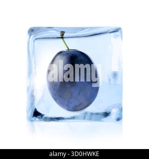 Fresh plum inside ice cube isolated on white Stock Photo