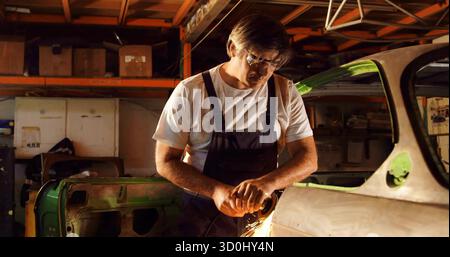 On a workbench, a metal surface supports a dark mold, a white molded ...