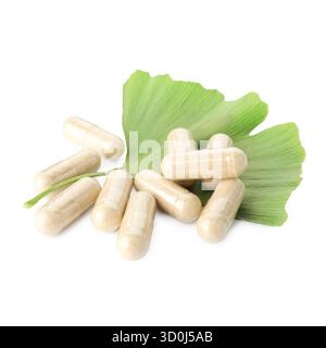 Ginkgo biloba leaves and pills isolated on white Stock Photo