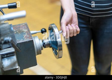 Old worn out milling machine control panel and control dial in a workshop Stock Photo