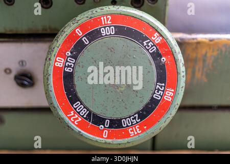 Old worn out milling machine control panel and control dial in a workshop Stock Photo