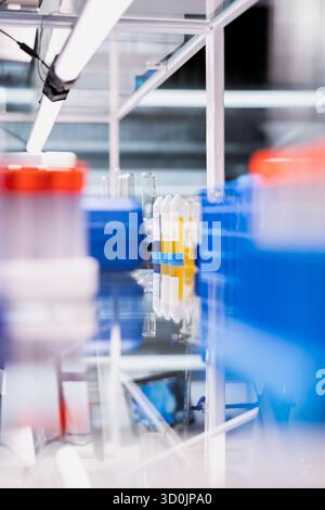 Fluids In Lab Containers Containers with urine samples for analysis and glassware on test forms ...