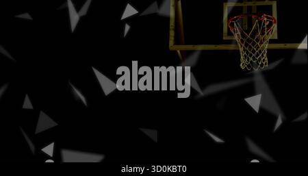 Displaying basketball hoop, backboard, net in digital space with gray triangles, copy space Stock Photo