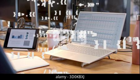 Laptop on stand displaying spreadsheet in office, with tablet charts, coffee cup, water bottle Stock Photo
