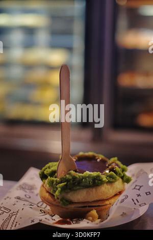 Pie with peas and gravy, 'The Tiger' on the counter at Harry's Cafe De Wheels, pie cart caravan at Woolloomooloo, Sydney, Australia Stock Photo