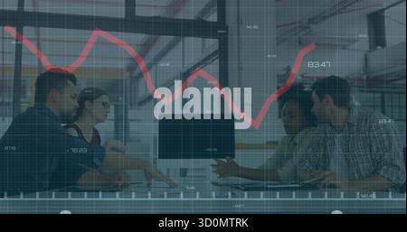 Office professionals reviewing monitor in open-plan office, with laptops and red line chart overlay Stock Photo
