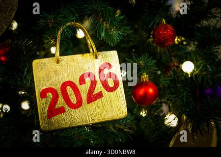 Decorated Christmas tree on blurred, sparkling and fairy background Stock Photo