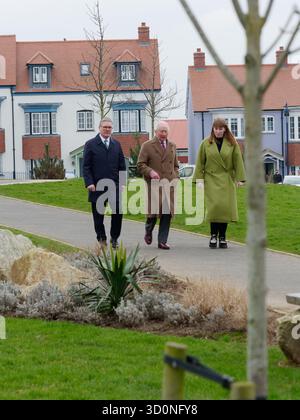 King Charles shows the Prime Minister Sirt Keir Starmer and the now ex Deputy Prime Minister Angela Rayner around Nansledan new town, Nansledan was conceived by the King whilst he was the Prince of Wales, It is built on Duchy of Cornwall land on the outskirts of Newquay. Sir Keir Starmer voiced his intention to replicate the model with twelve new towns mooted. The most recent data from the Office for National Statistics shows that just 32,560 homes were completed in the first three months of this year – the lowest recorded since the pandemic. But earlier this month, Housing Secretary Steve Ree Stock Photo
