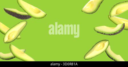 Fresh avocado slices falling on green background Stock Photo