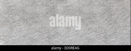 Rough gray concrete wall texture providing an abstract background Stock Photo