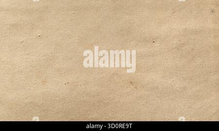 Distressed aged paper showing a vintage brown surface with small details Stock Photo