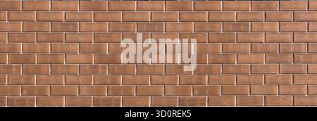 Brick wall surface creating a uniform texture and pattern for backgrounds Stock Photo