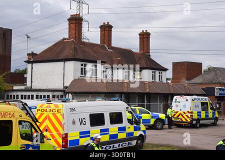 Epping, UK. 27th July 2025. A heavy police presence outisde the Bell Hotel in Epping as both pro- and anti- migrant protesters gather. Several anti-migrant protests targeting the hotel have taken place, after an asylum seeker was charged with allegedly trying to kiss a 14-year-old girl. Credit: Vuk Valcic/Alamy Stock Photo
