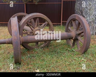 Vintage steam locomotive engine drive wheel grunge. Vintage steam locomotive driving wheels. Stock Photo