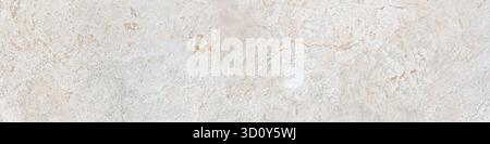 Beige limestone similar to marble surface or texture background in banner format. High resolution photography Stock Photo