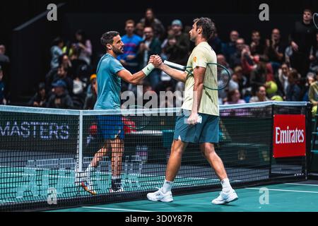 Nanterre, France. 05th Oct, 2025. Damir Dzumhur (BIH) and Quentin Halys (FRA) shaking hands during the Rolex Paris Masters 2025, ATP Masters 1000 tennis tournament, Qualifying, on 25 October 2025 at Paris La Défense Arena in Nanterre near Paris, France - Photo Alexandre Martins/DPPI Credit: DPPI Media/Alamy Live News Stock Photo