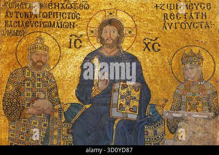Mosaic of Jesus Christ with Emperor Constantine IX Monomachos and Empress Zoe standing before him (11th century). It is located on east wall in upper Stock Photo