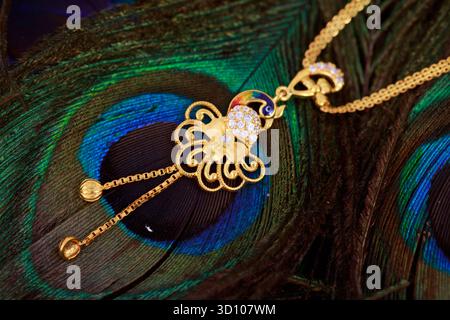 Children’s Gold Dollar and Chain Jewelry – Traditional Indian Kids Gold Ornament Close-up on White Background Stock Photo